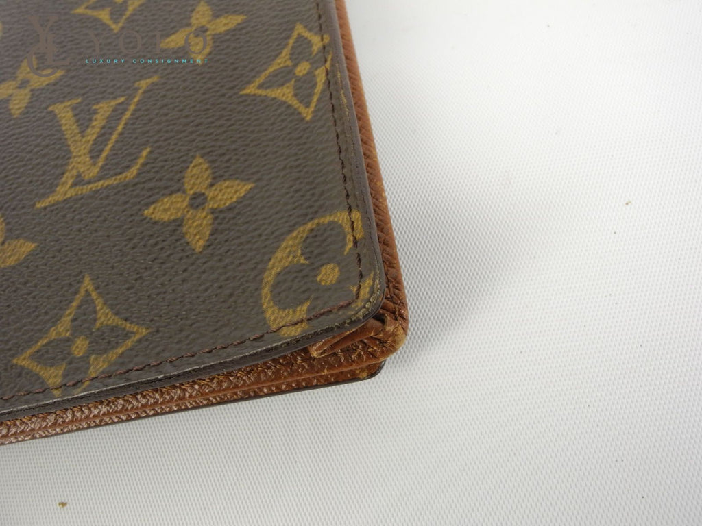 Authenticity Guaranteed - Louis Vuitton Taiga Bifold Wallet